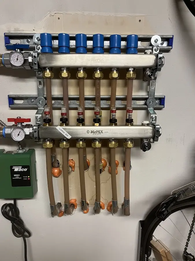 Plumber performing Water Heater Repair at a residential property in Clarks Summit